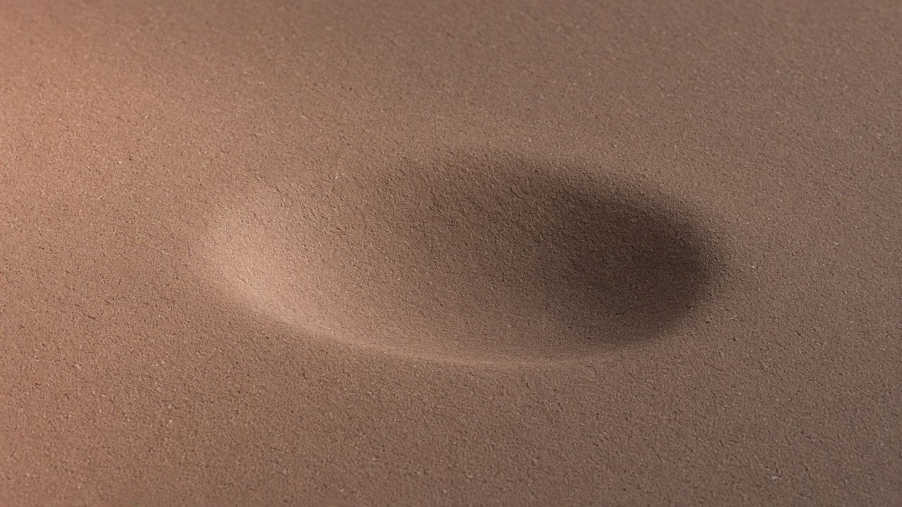 Pressed clay-toned fibre board with a wide shallow depression.