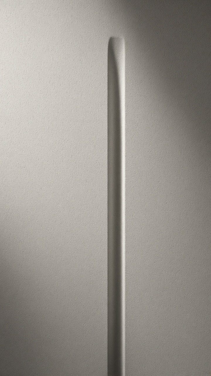 Vertical pressure-formed polymer sheet with a thin slit recess.